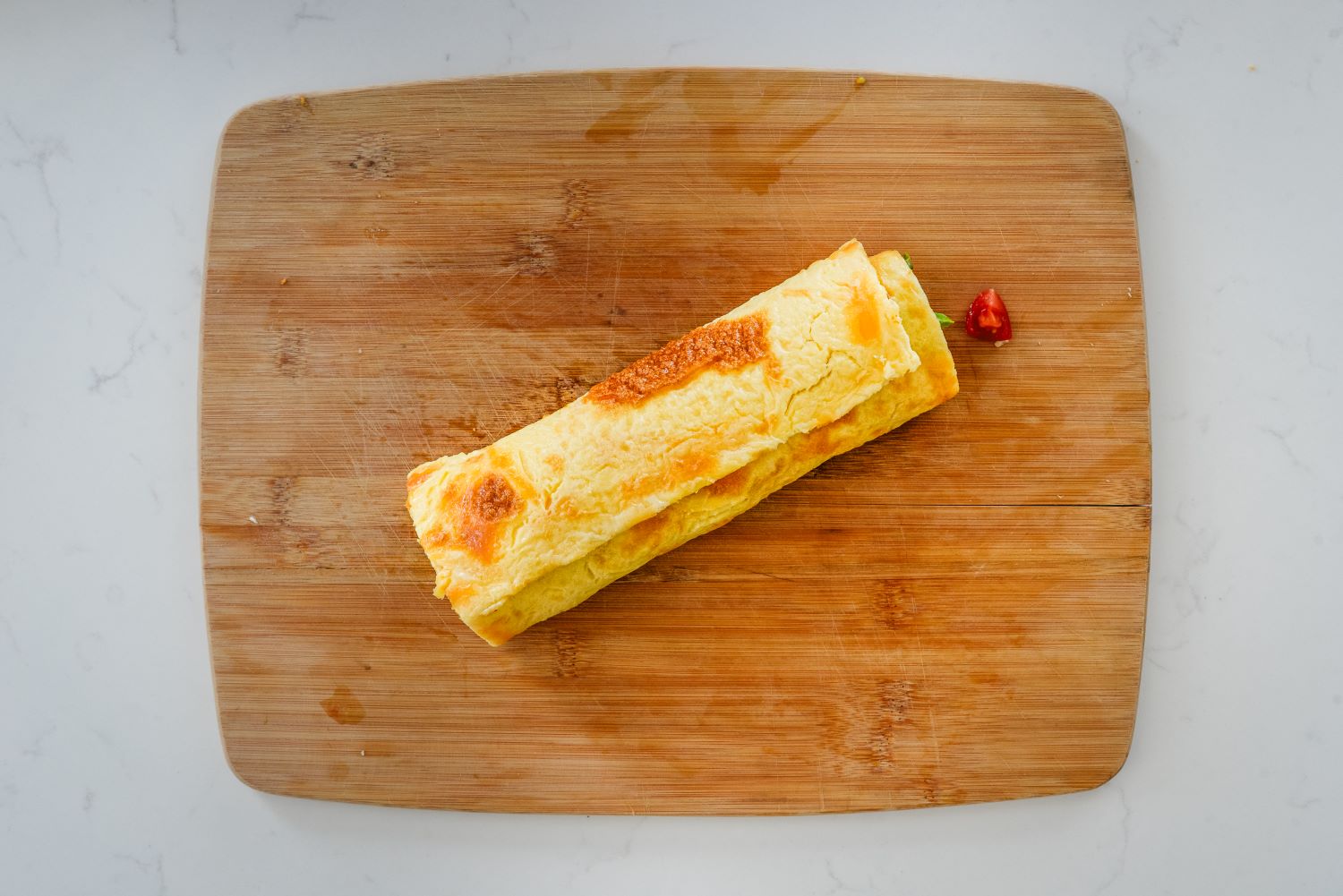 DMI_CottageCheeseWraps-7.jpg high-protein cottage cheese and egg flatbread rolled into a wrap.