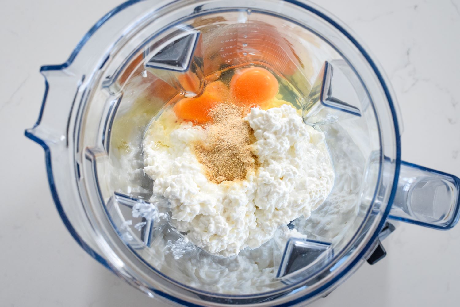 DMI_CottageCheeseWraps-(1).jpg cottage cheese, eggs, onion powder and garlic powder in a blender.
